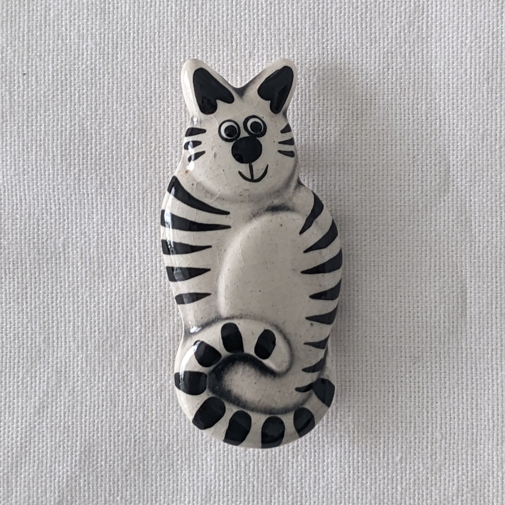 2 3/4" Black/White stripe Cat pin.